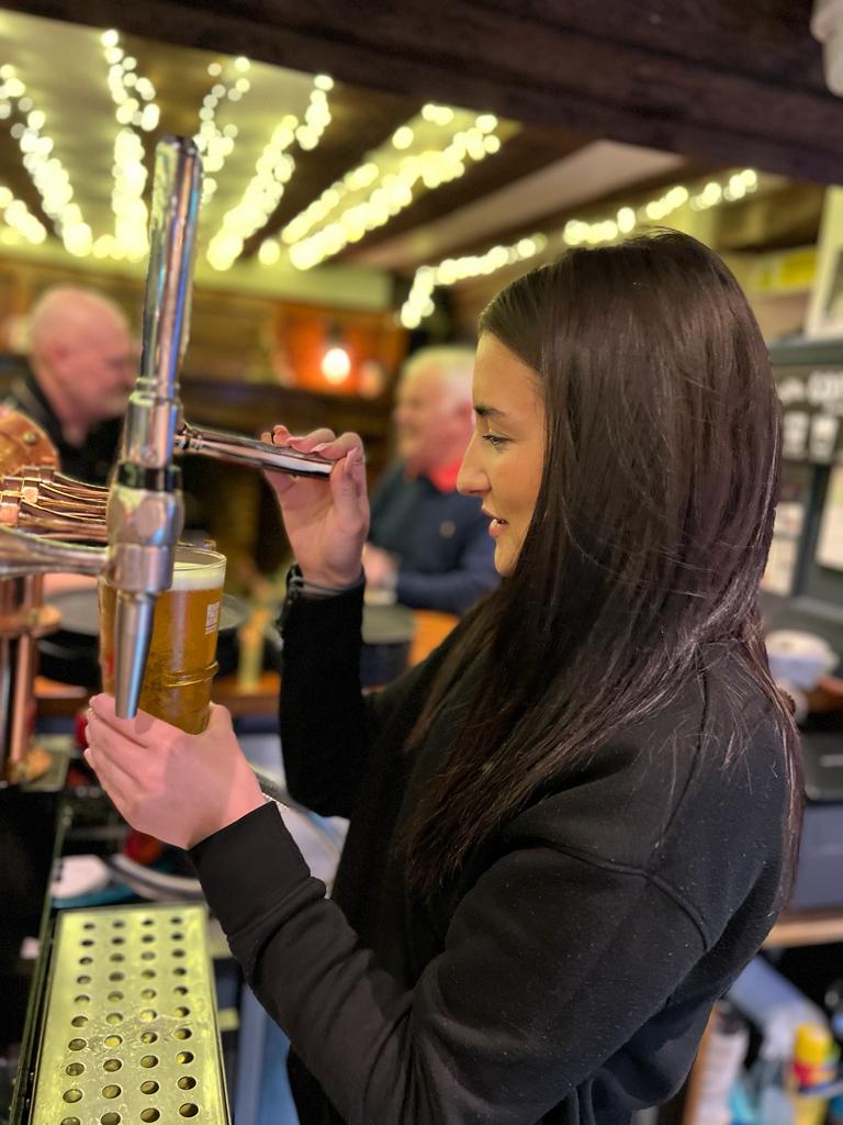 Nicole Pouring Pint